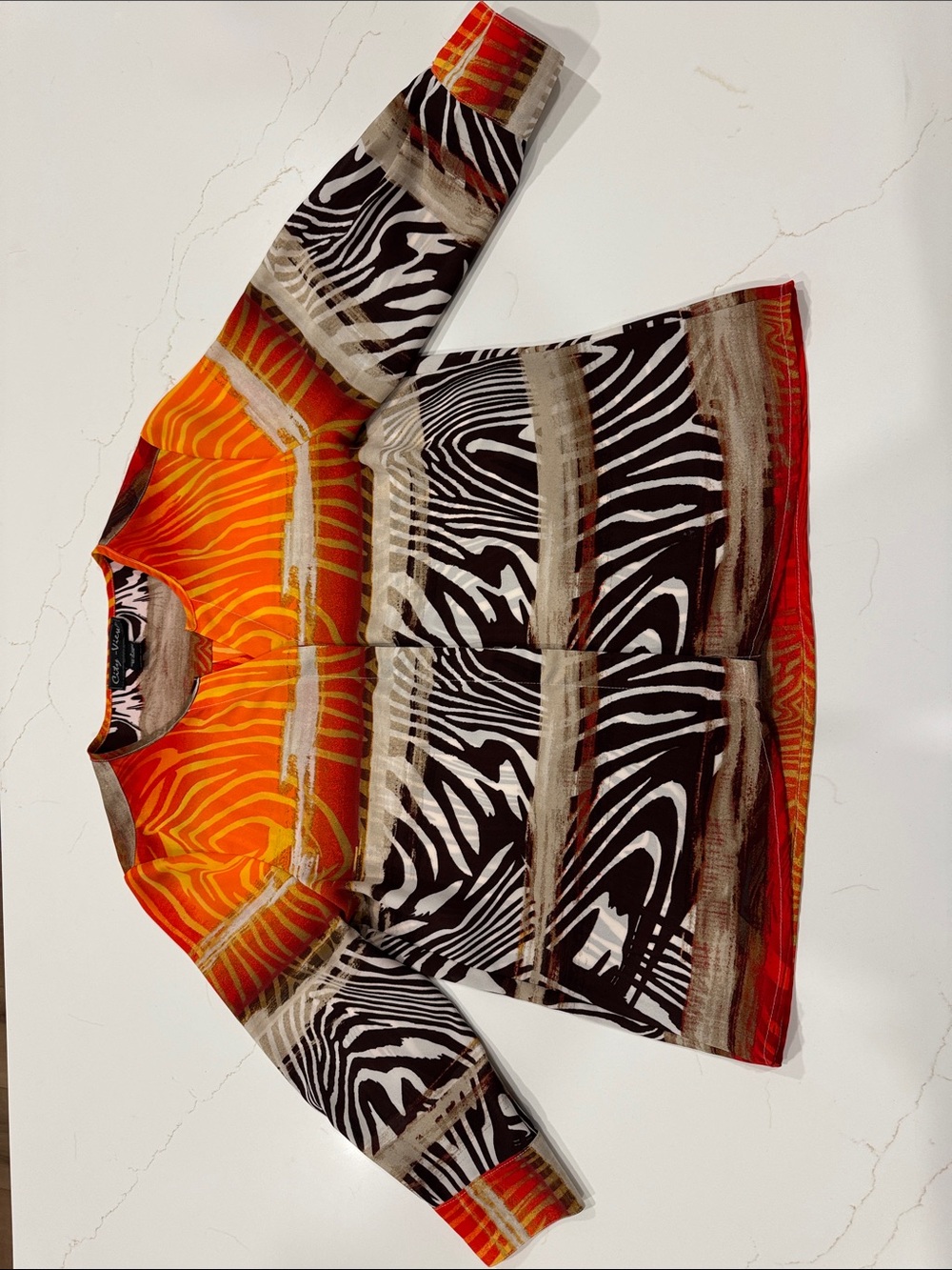 Women’s Long-Sleeve Animal Print Top in Orange & Black